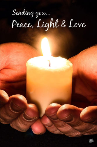 Condolence message on picture of hands holding a candle.