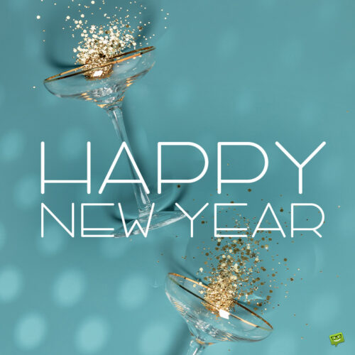Elegant Happy New Year image with champagne glasses and stardust on blue background. Happy New Year wish.