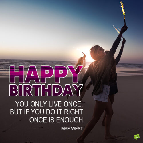 Inspirational birthday wish on image of women holding torches and celebrating on the beach.