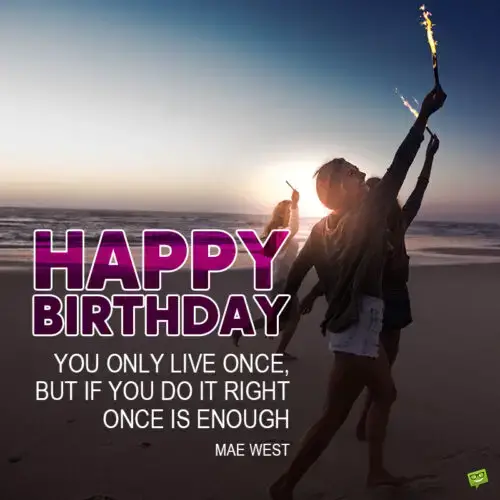 Inspirational birthday wish on image of women holding torches and celebrating on the beach.