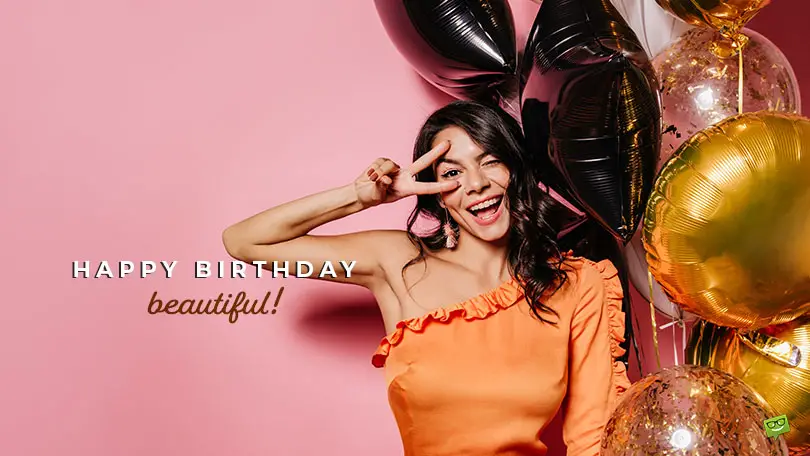 Featured image for a blog post with birthday wishes for beautiful women. On the image there is a beautiful lady celebrating her birthday.