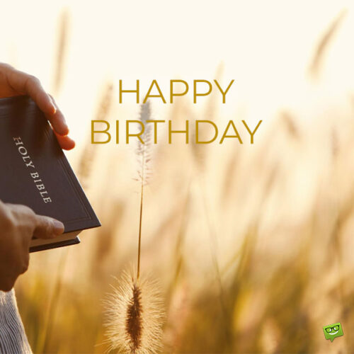 A happy birthday image for a Pastor. The image features a man holding the Holy Bible in a nature landscape.